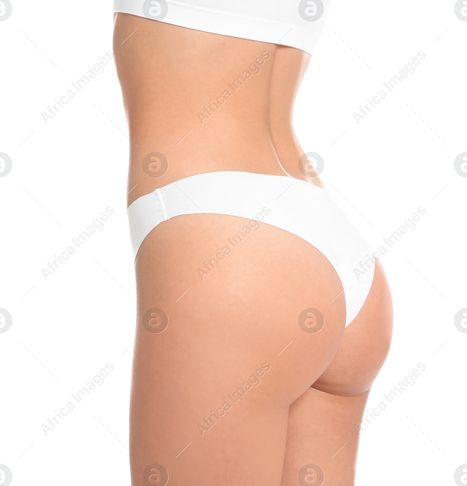 Photo of Slim young woman with smooth gentle skin on white background, closeup. Beauty and body care concept