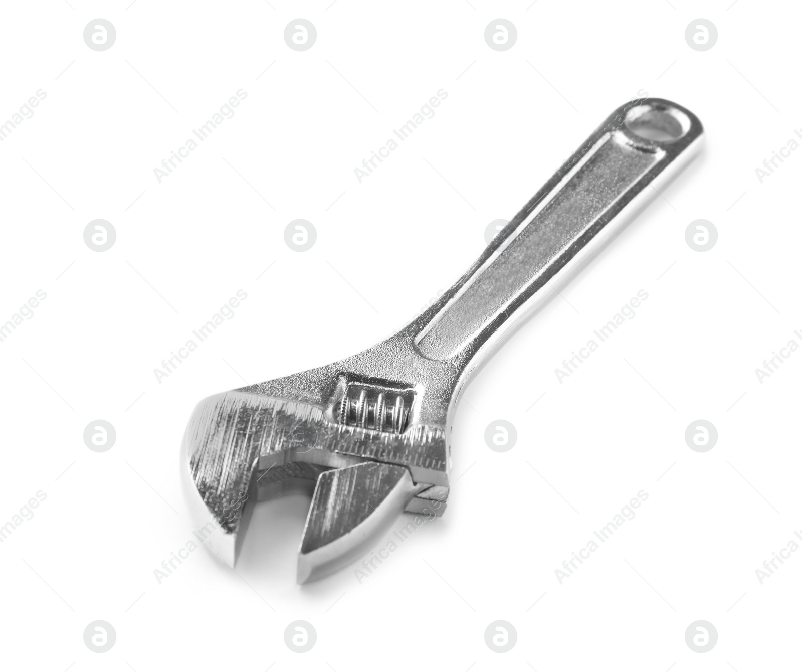 Photo of New adjustable wrench on white background. Plumber tools