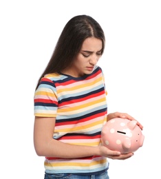 Photo of Portrait of young woman with piggy bank on white background