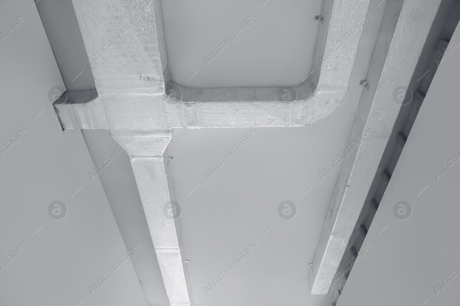 Photo of Ceiling with ventilation system indoors, bottom view