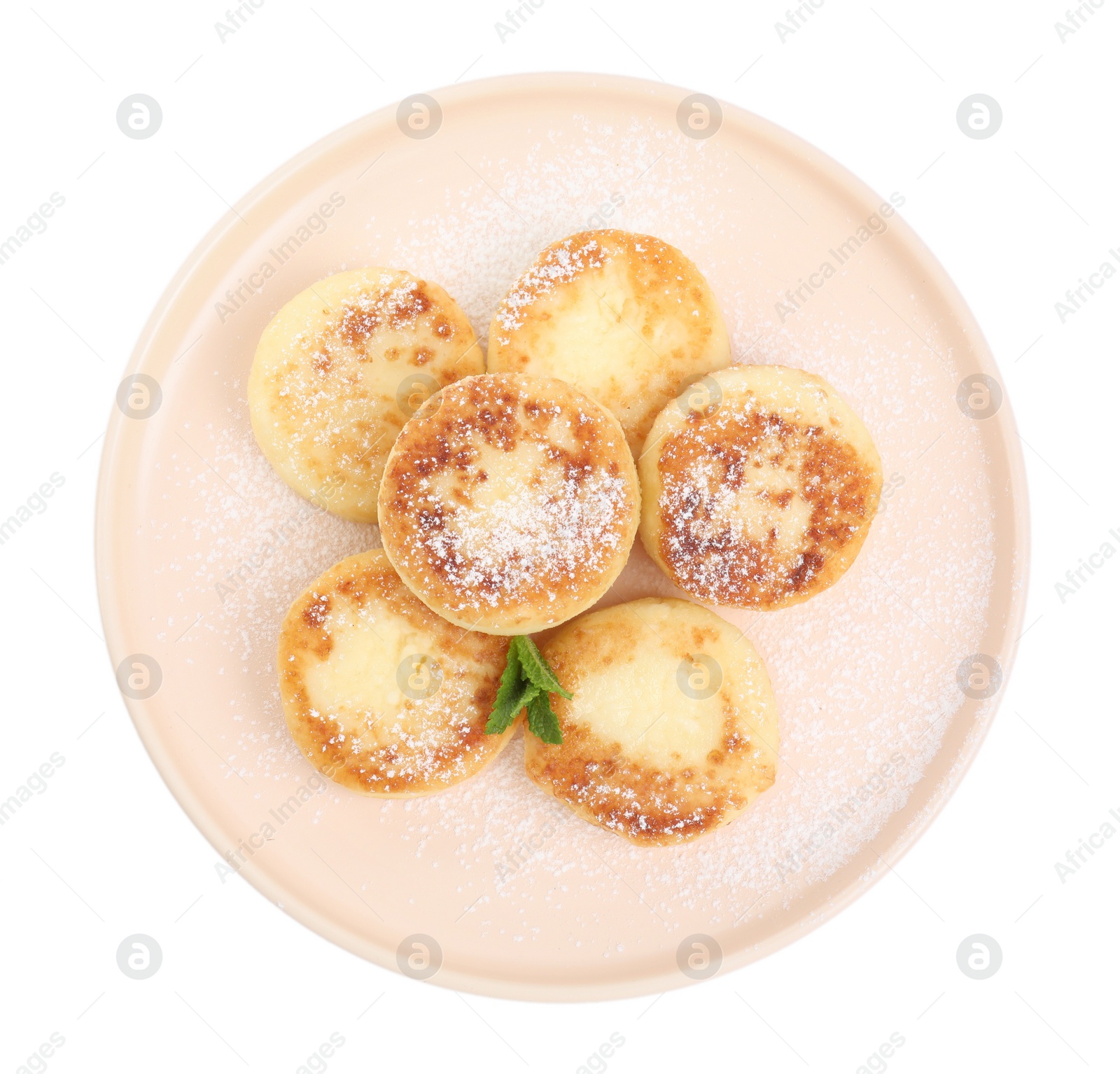 Photo of Delicious cottage cheese pancakes with mint and icing sugar isolated on white, top view