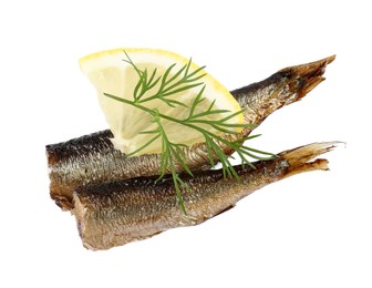 Tasty canned sprats, lemon and dill isolated on white, top view