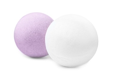 Photo of Two colorful bath bombs on white background