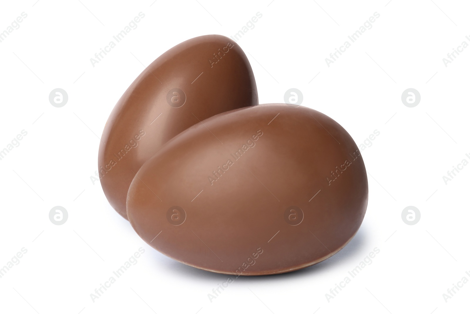 Photo of Two tasty chocolate eggs isolated on white