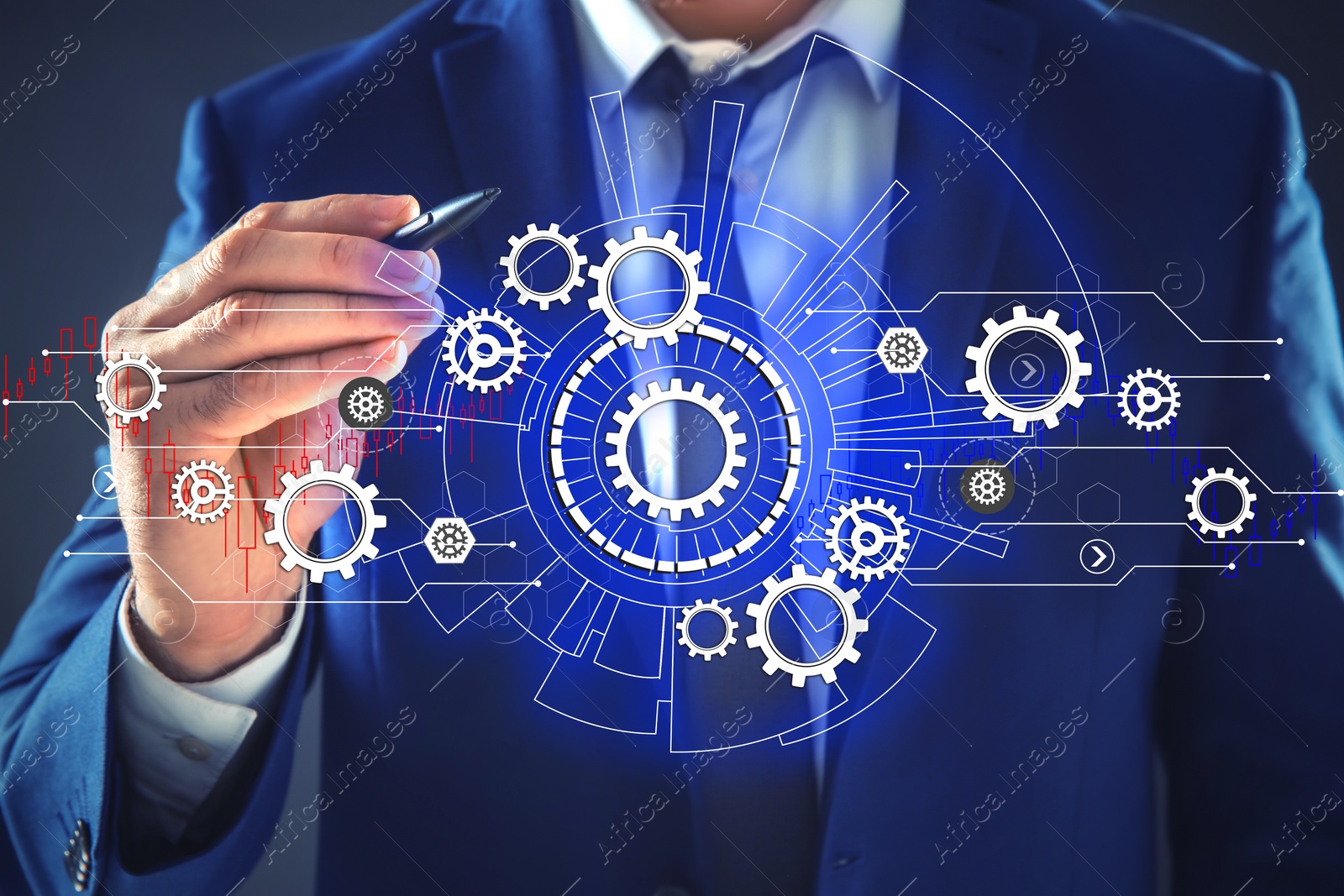 Image of Businessman demonstrating gear mechanism on dark background, closeup