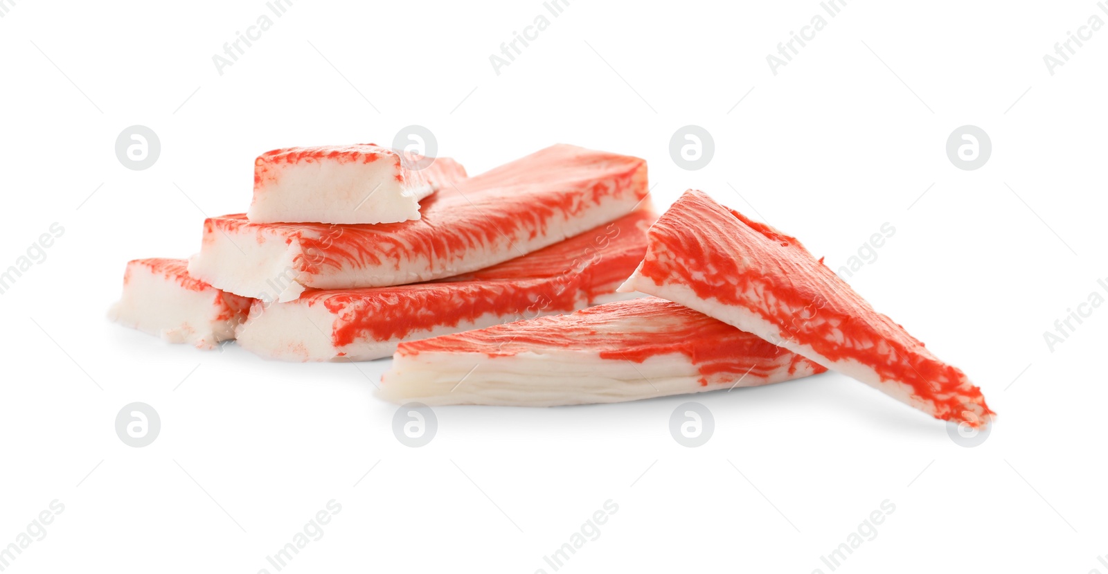 Photo of Delicious fresh crab sticks isolated on white