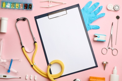 Flat lay composition with medical objects on color background. Space for text