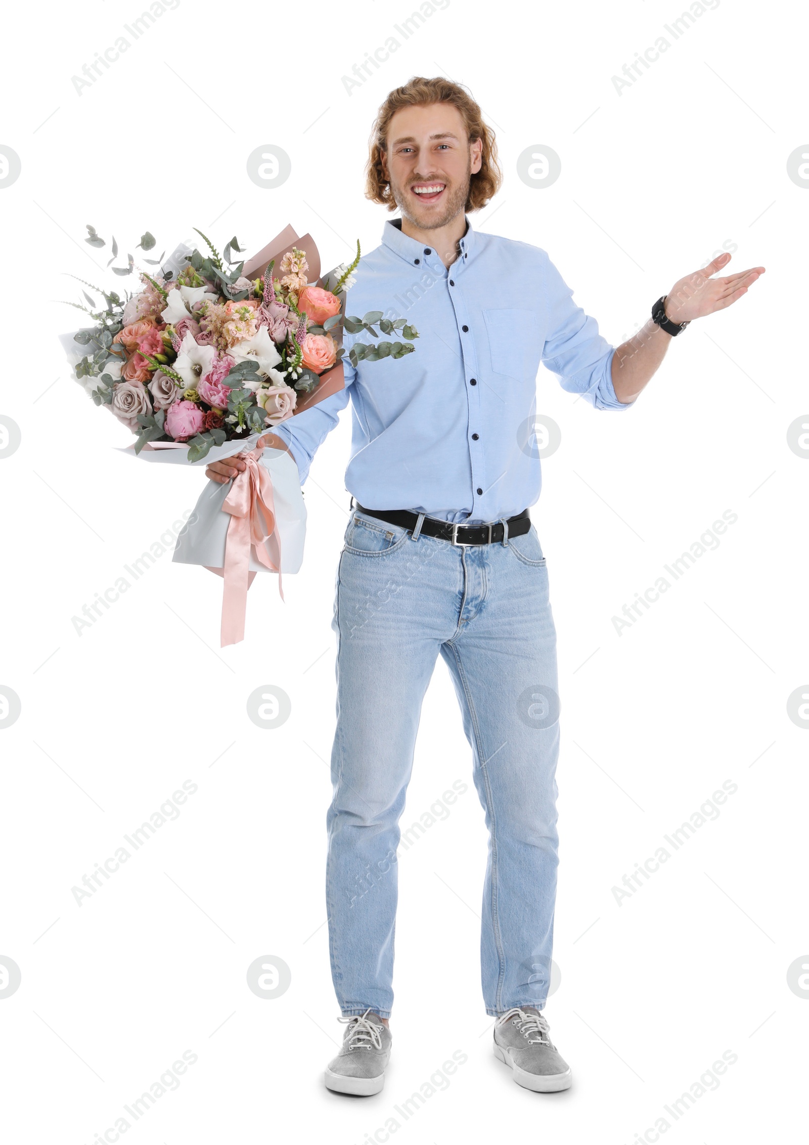 Photo of Young handsome man with beautiful flower bouquet on white background