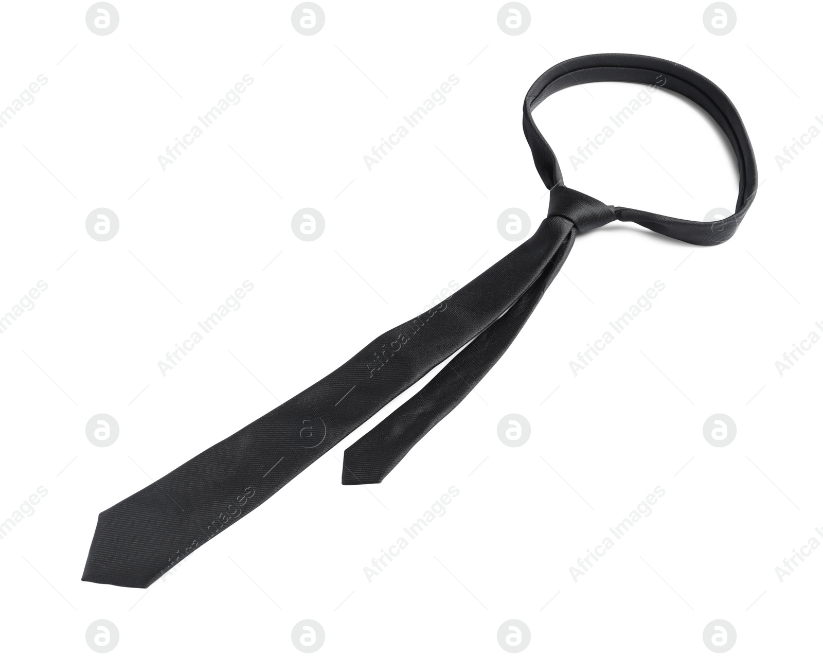 Photo of One black necktie isolated on white, above view