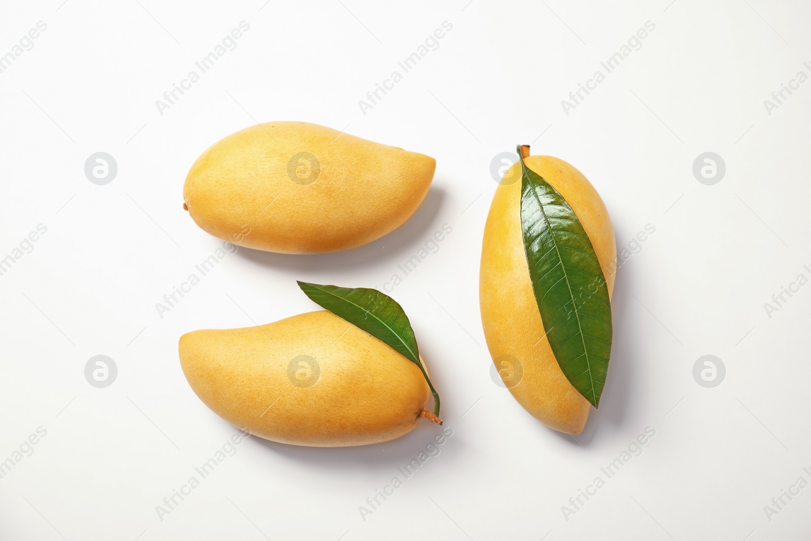 Photo of Composition with fresh mango fruits on white background, top view