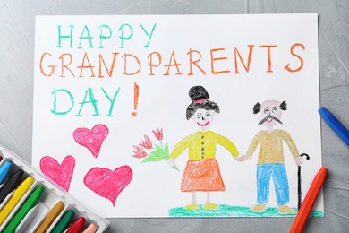 Beautiful drawing on grey table, flat lay. Happy Grandparents Day