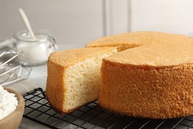 Photo of Delicious fresh homemade cake on grey table