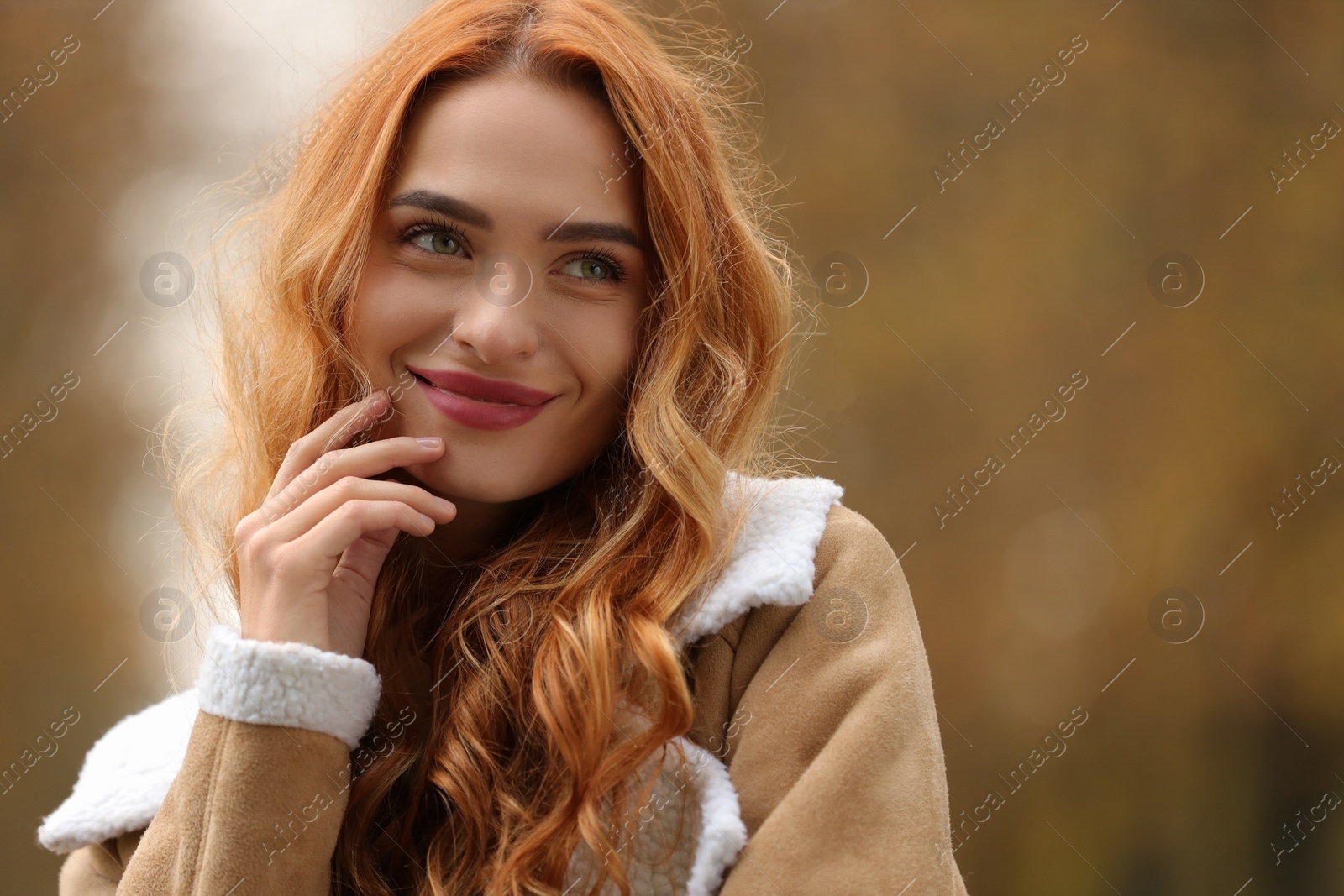 Photo of Autumn vibes. Portrait of beautiful woman outdoors. Space for text