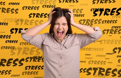 Stressed young woman and text on yellow background