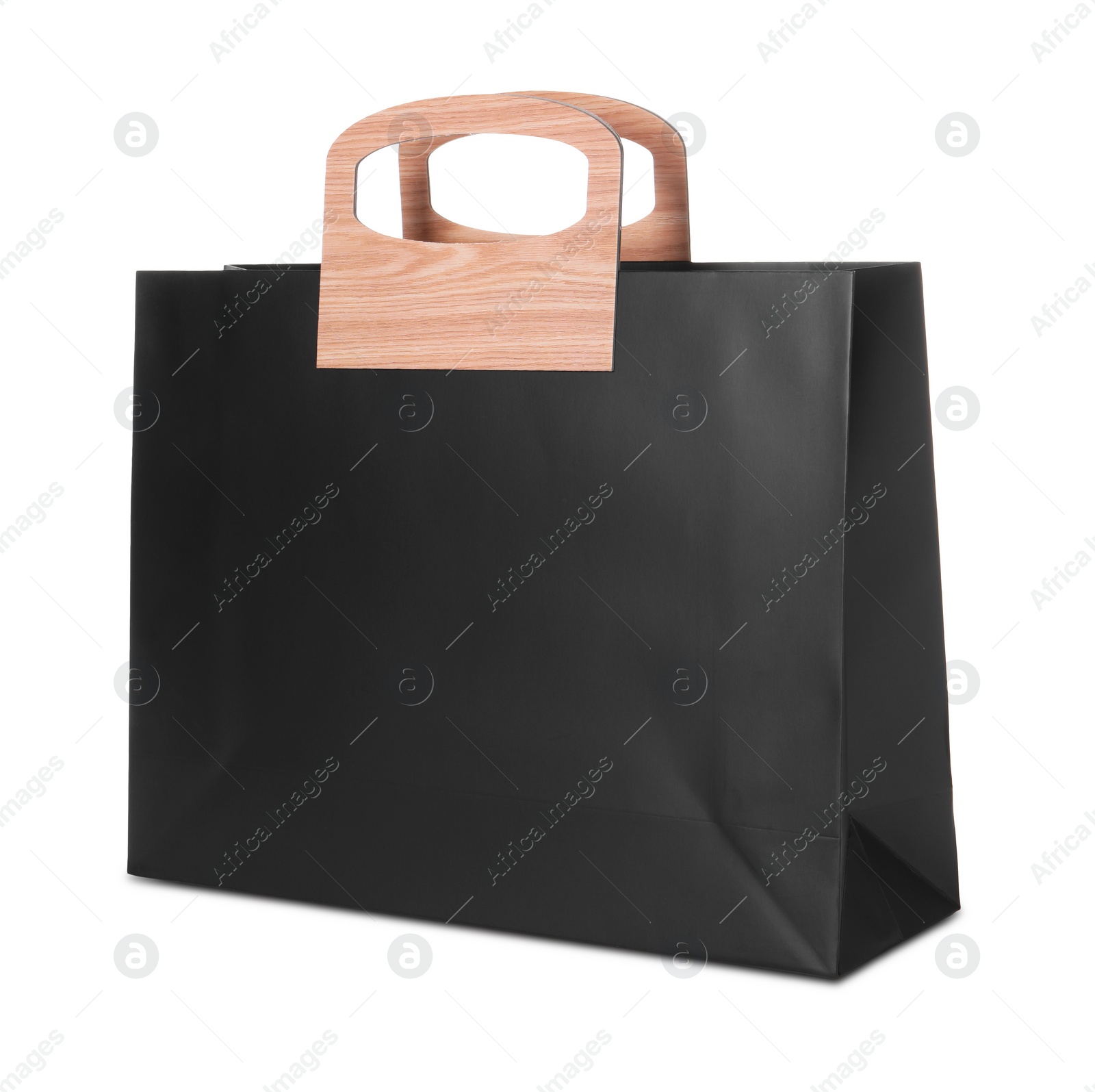 Photo of One black paper bag isolated on white