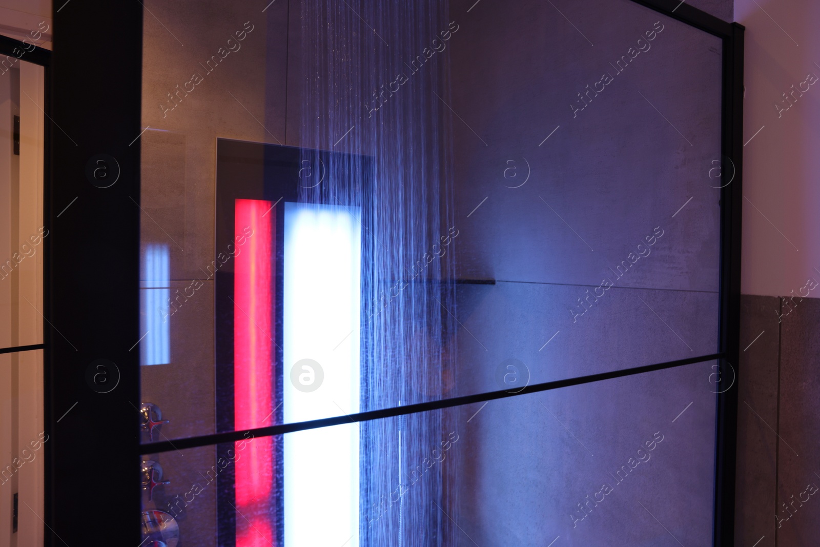 Photo of Modern shower with Infrared spectrum, UV light and flowing water