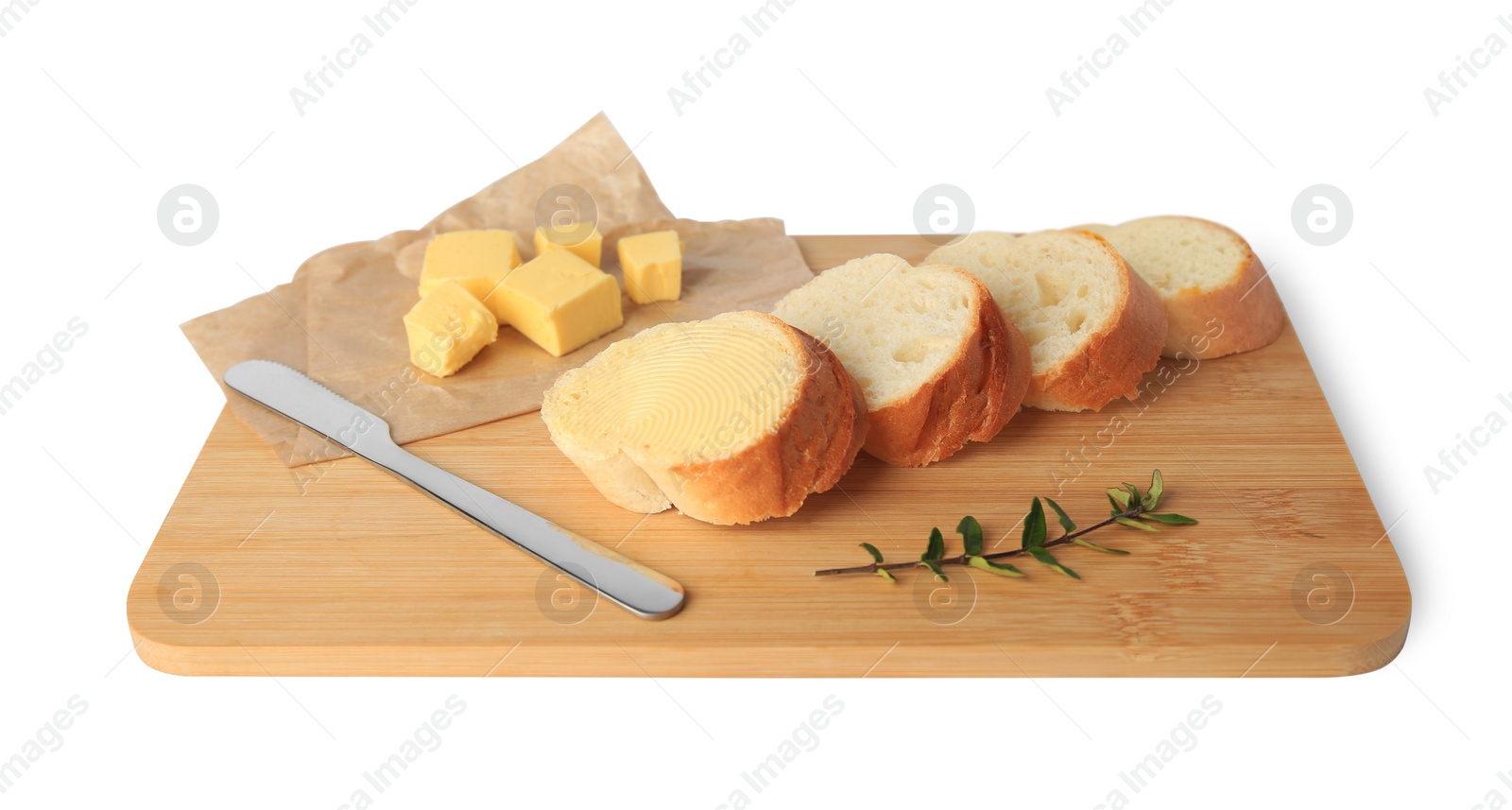 Photo of Wooden board with sliced baguette and fresh butter on white background