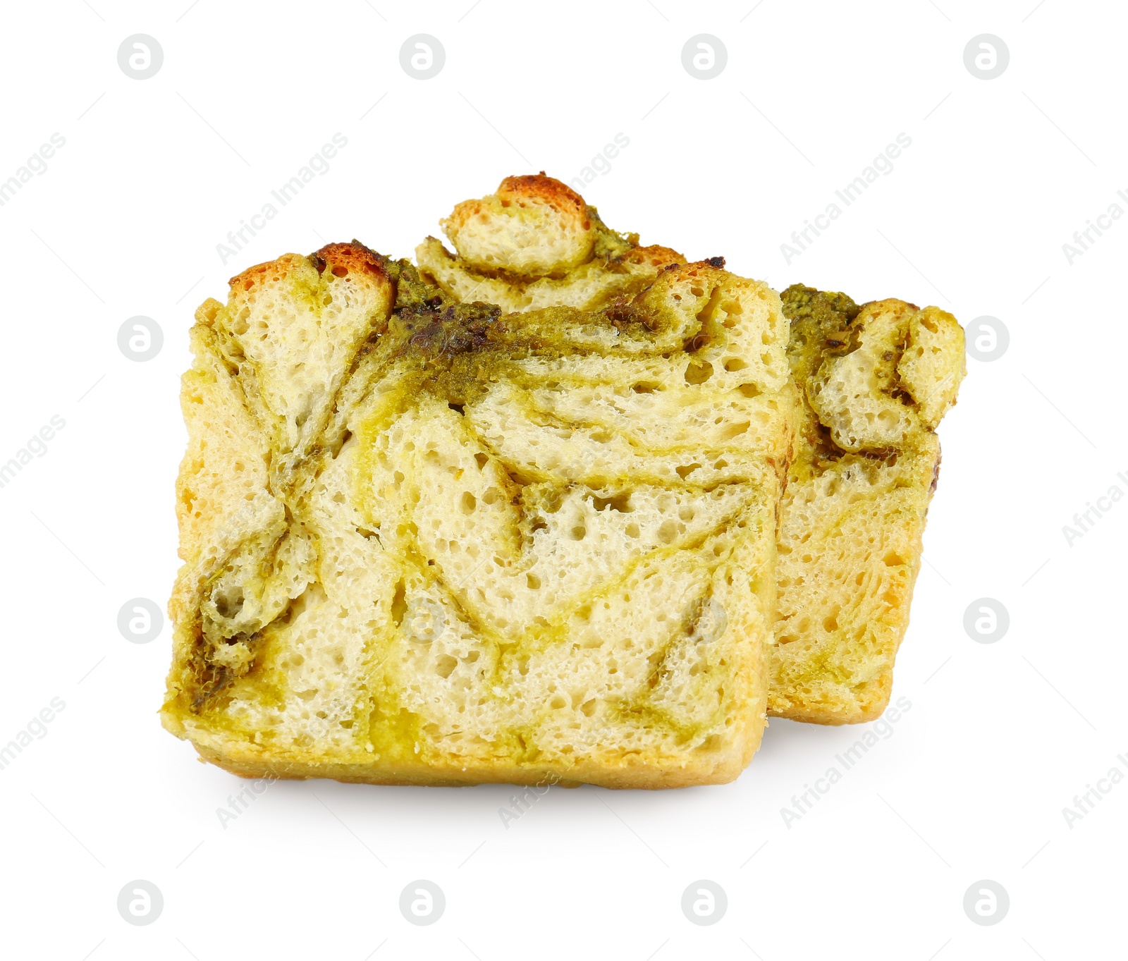 Photo of Slices of freshly baked pesto bread isolated on white