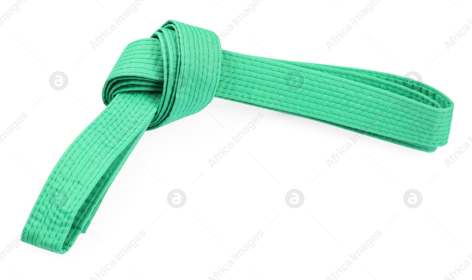 Photo of Green karate belt isolated on white. Martial arts uniform
