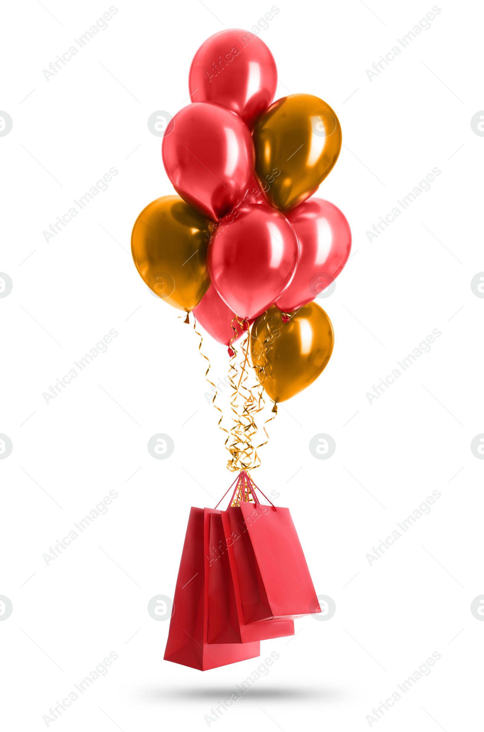 Image of Bunch of color balloons and red paper bags on white background