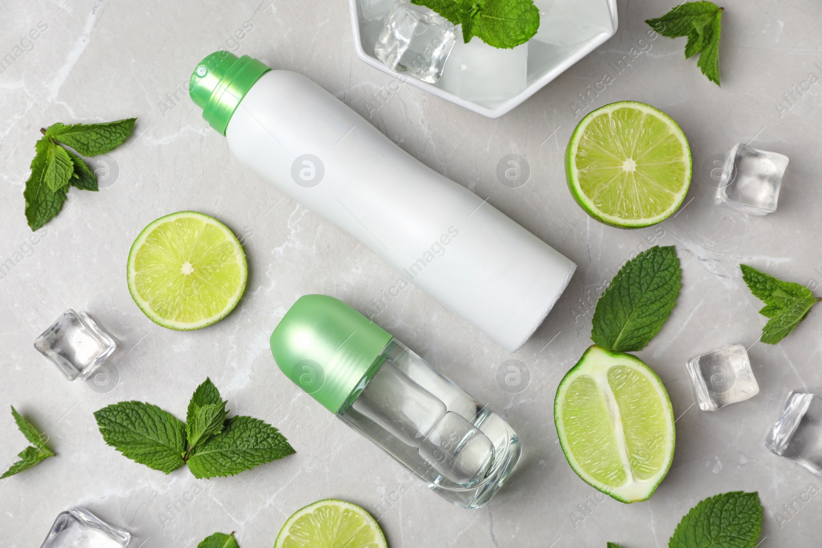 Photo of Flat lay composition with different deodorants on table