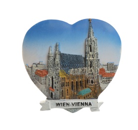 Photo of MYKOLAIV, UKRAINE - DECEMBER 24, 2018: Souvenir fridge magnet from Vienna, Austria on white background