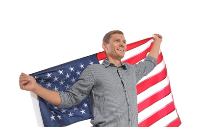 Portrait of man holding USA flag on white background