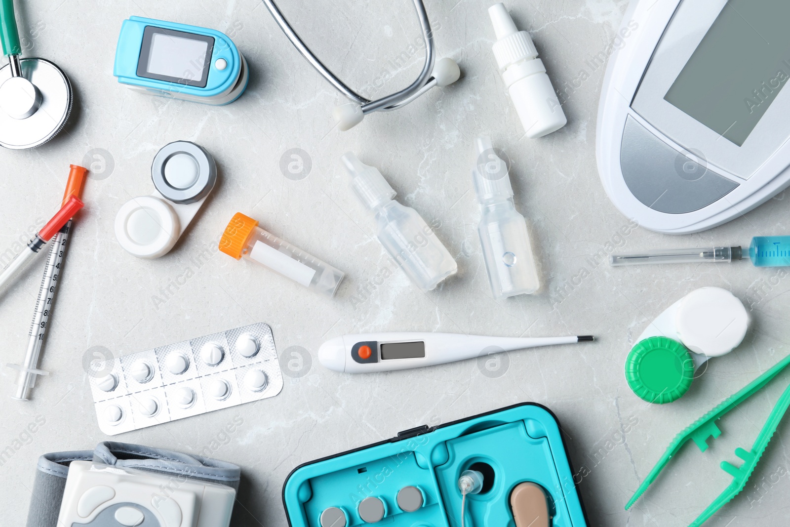 Photo of Flat lay composition with medical objects on grey background