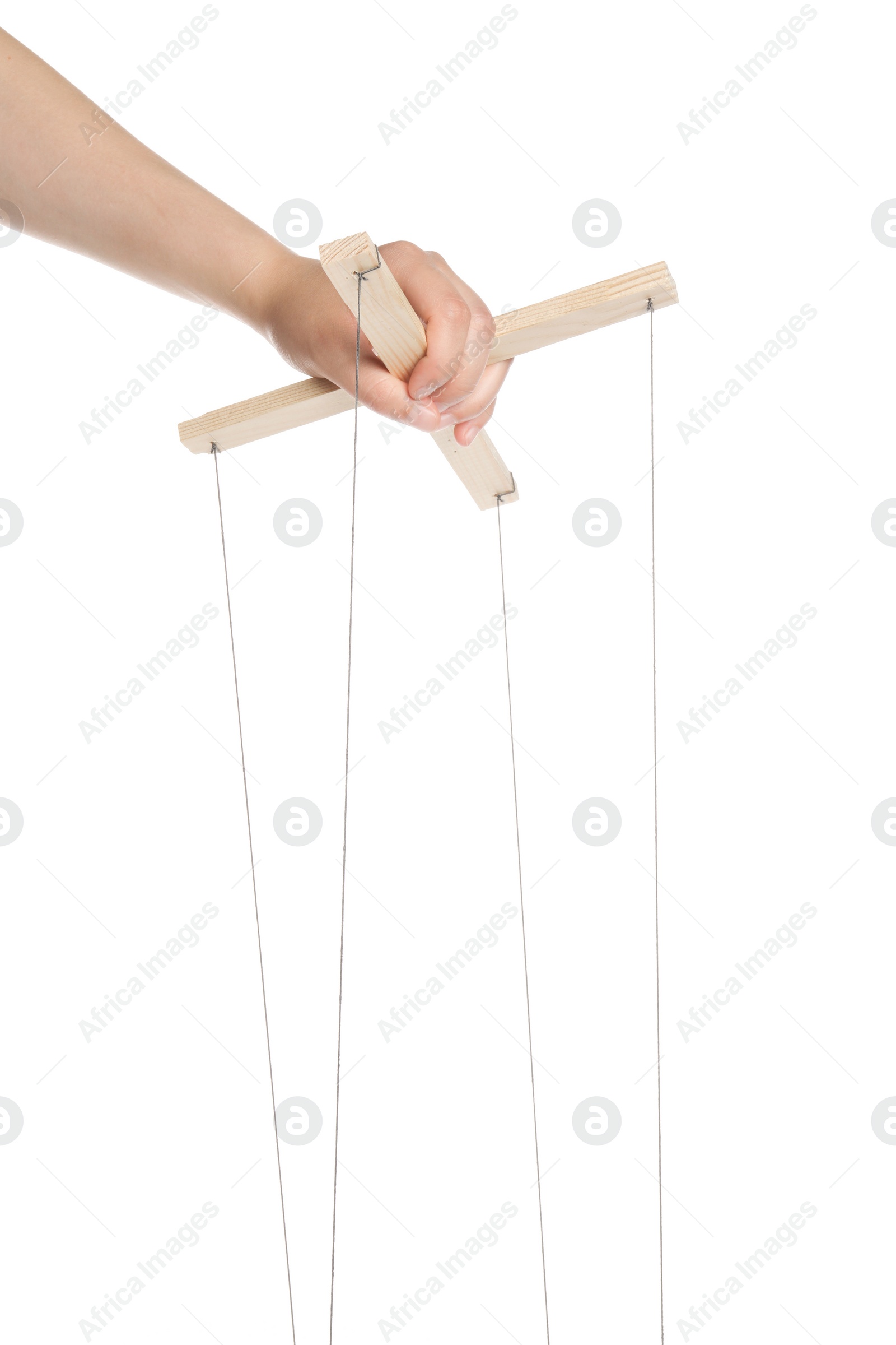 Photo of Woman pulling strings of puppet on white background, closeup