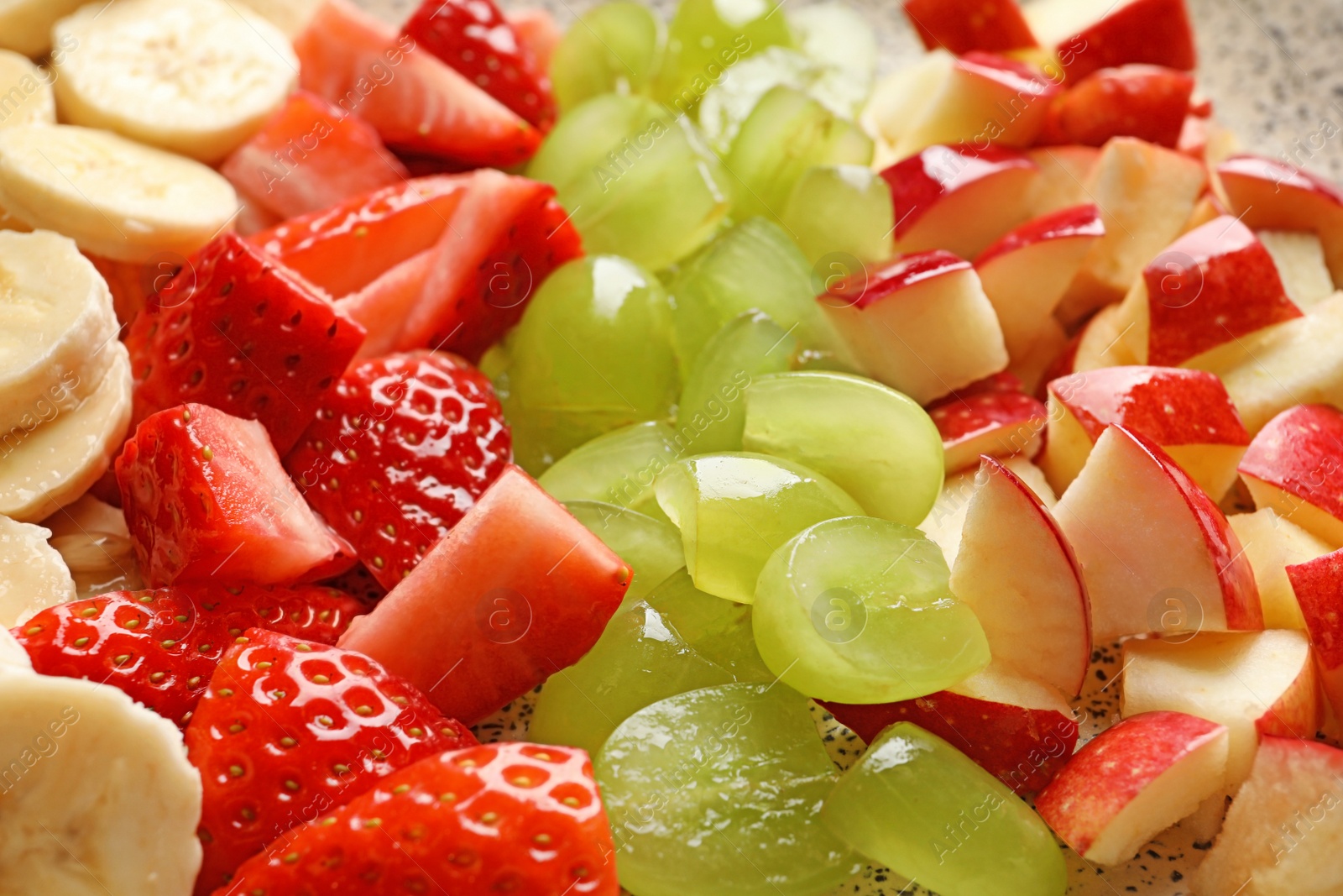 Photo of Different fresh cut fruits, closeup