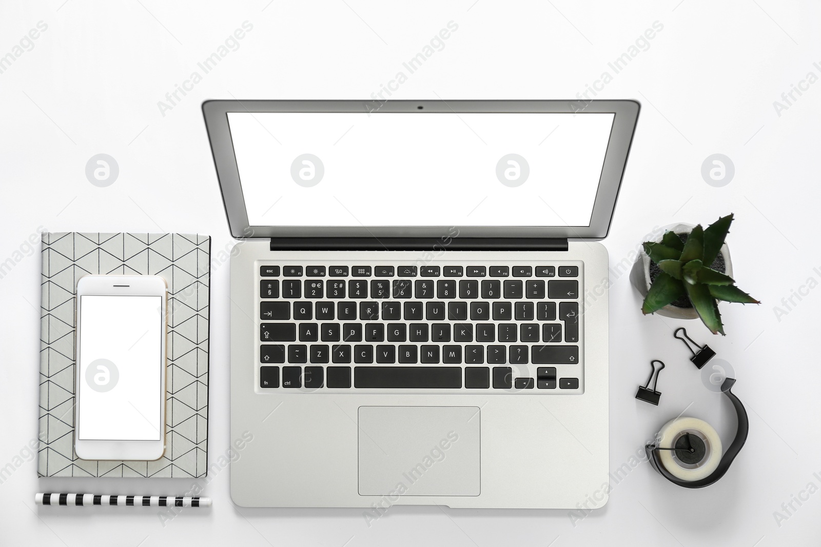 Photo of Composition with laptop and smartphone on white background, top view