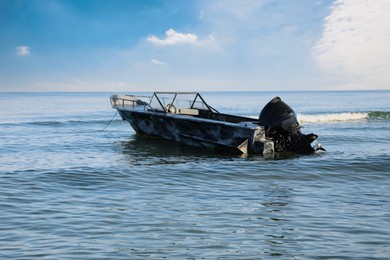 Motor boat at sea on sunny day