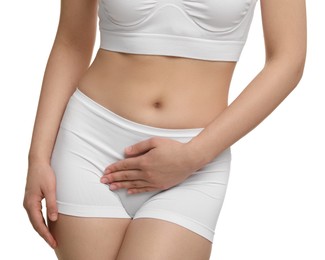 Woman suffering from cystitis on white background, closeup