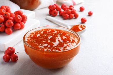 Delicious rowan jam in bowl on light table