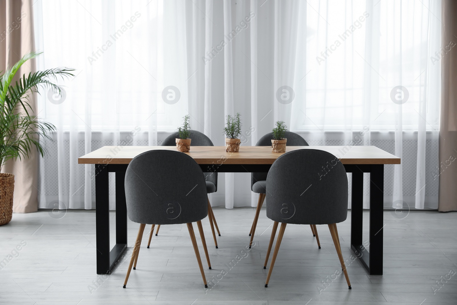 Photo of Modern room interior with chairs and table