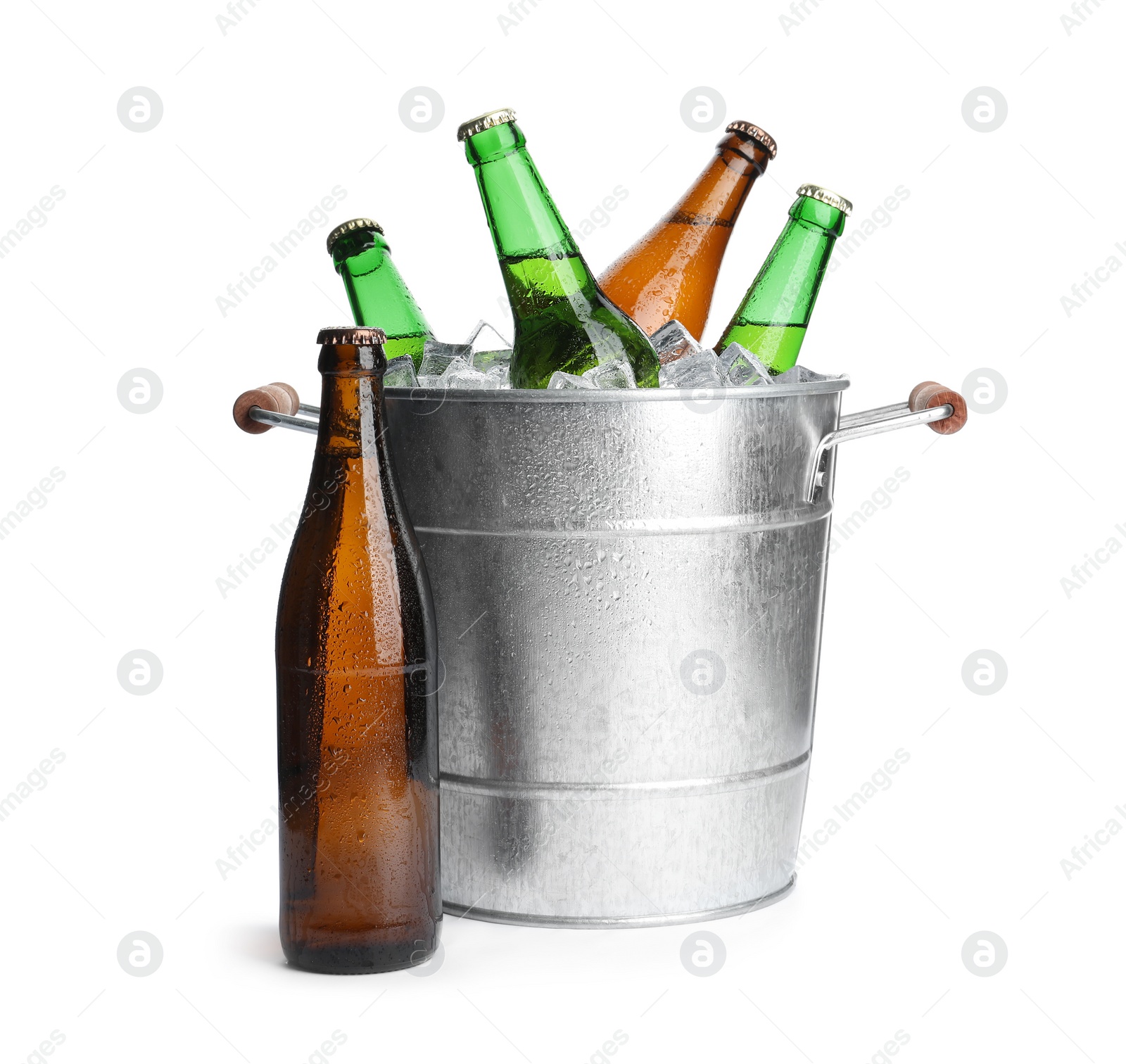 Photo of Metal bucket with bottles of beer and ice cubes isolated on white