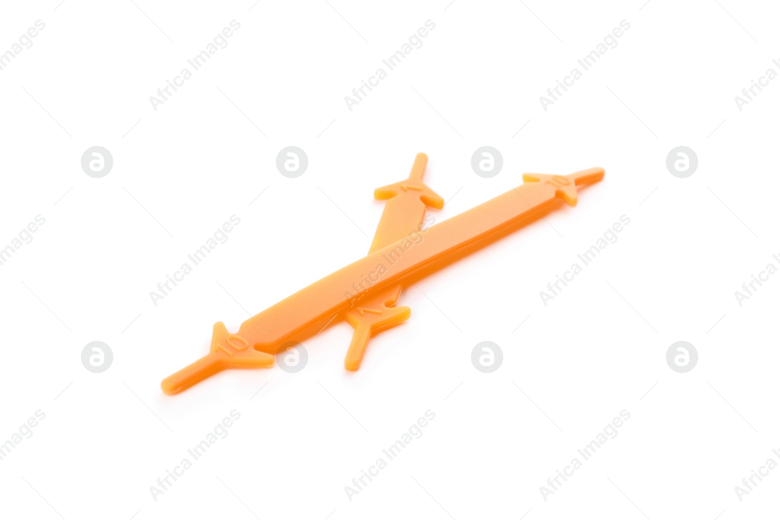 Photo of Orange silicone shoe laces on white background