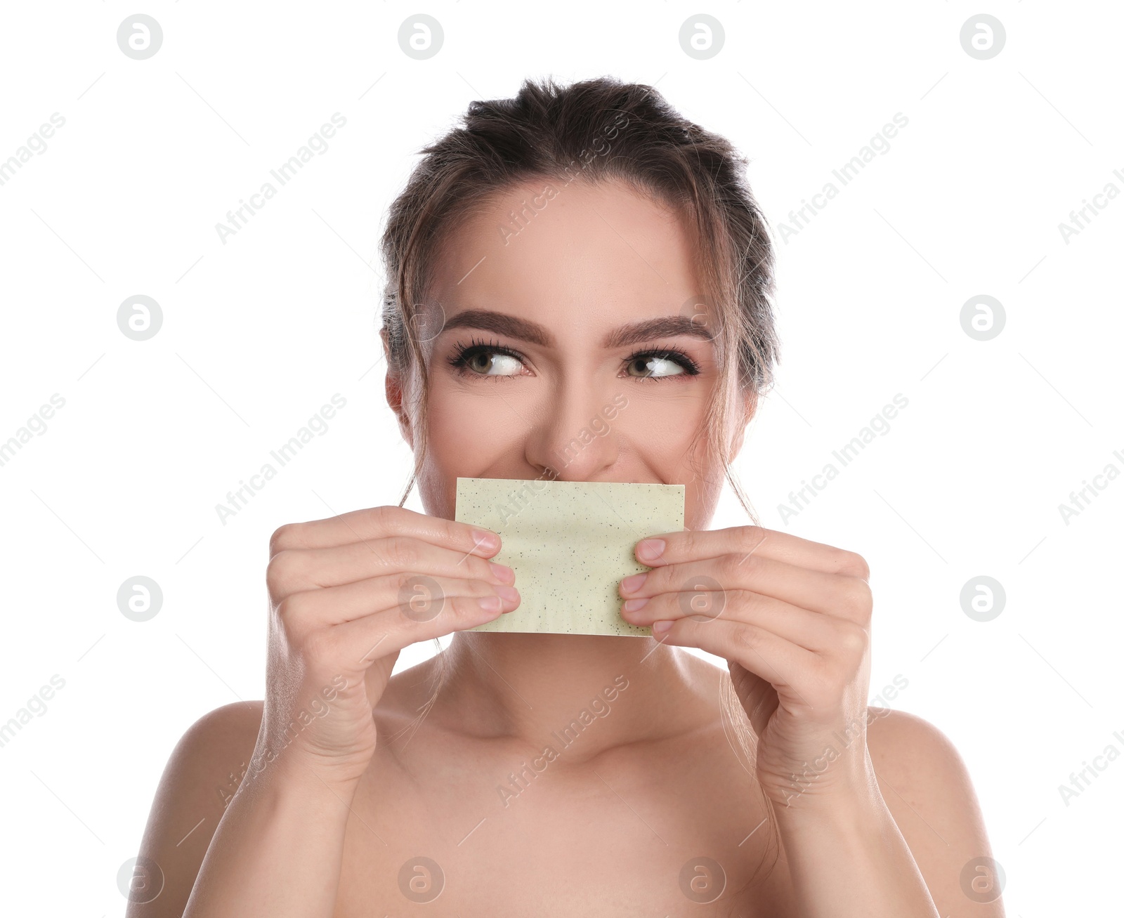 Photo of Beautiful woman using mattifying wipe on white background