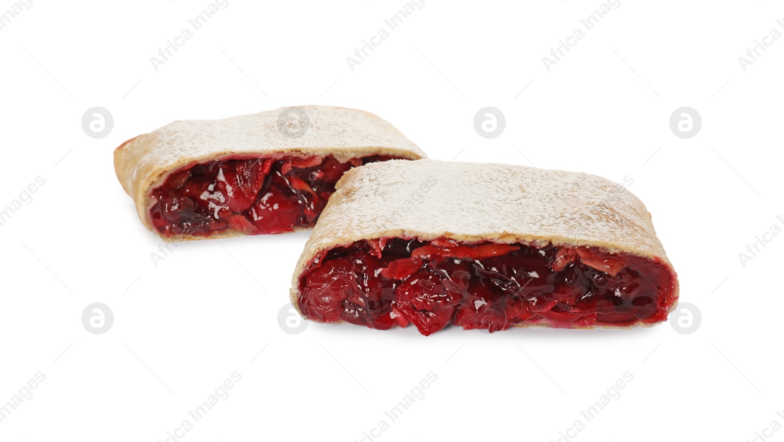 Delicious cut strudel with cherries isolated on white Photo of Delicious cut strudel with cherries isolated on white