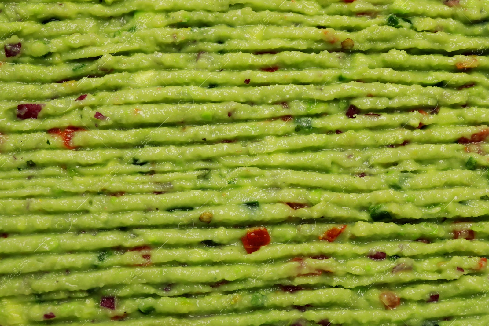 Delicious fresh guacamole as background, top view Photo of Delicious fresh guacamole as background, top view