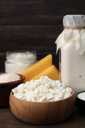 Photo of Different fresh dairy products on wooden table
