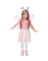 Photo of Cute little girl in fairy costume with violet wings on white background