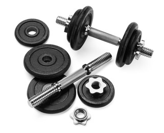 Photo of Metal dumbbell and parts on white background. Sports equipment