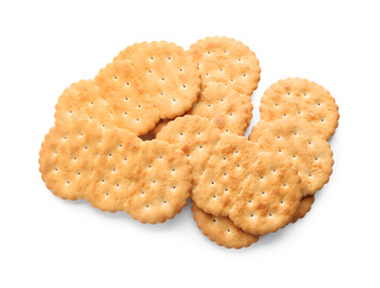 Photo of Delicious crispy crackers isolated on white, top view