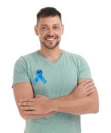Photo of Man with blue ribbon on white background. Urology cancer awareness
