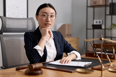 Photo of Portrait of notary at table in office