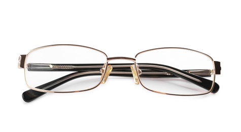 Photo of Glasses with corrective lenses on white background. Vision problem