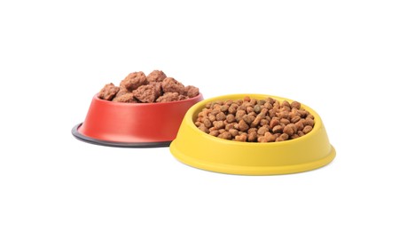 Photo of Dry and wet pet food in feeding bowls isolated on white