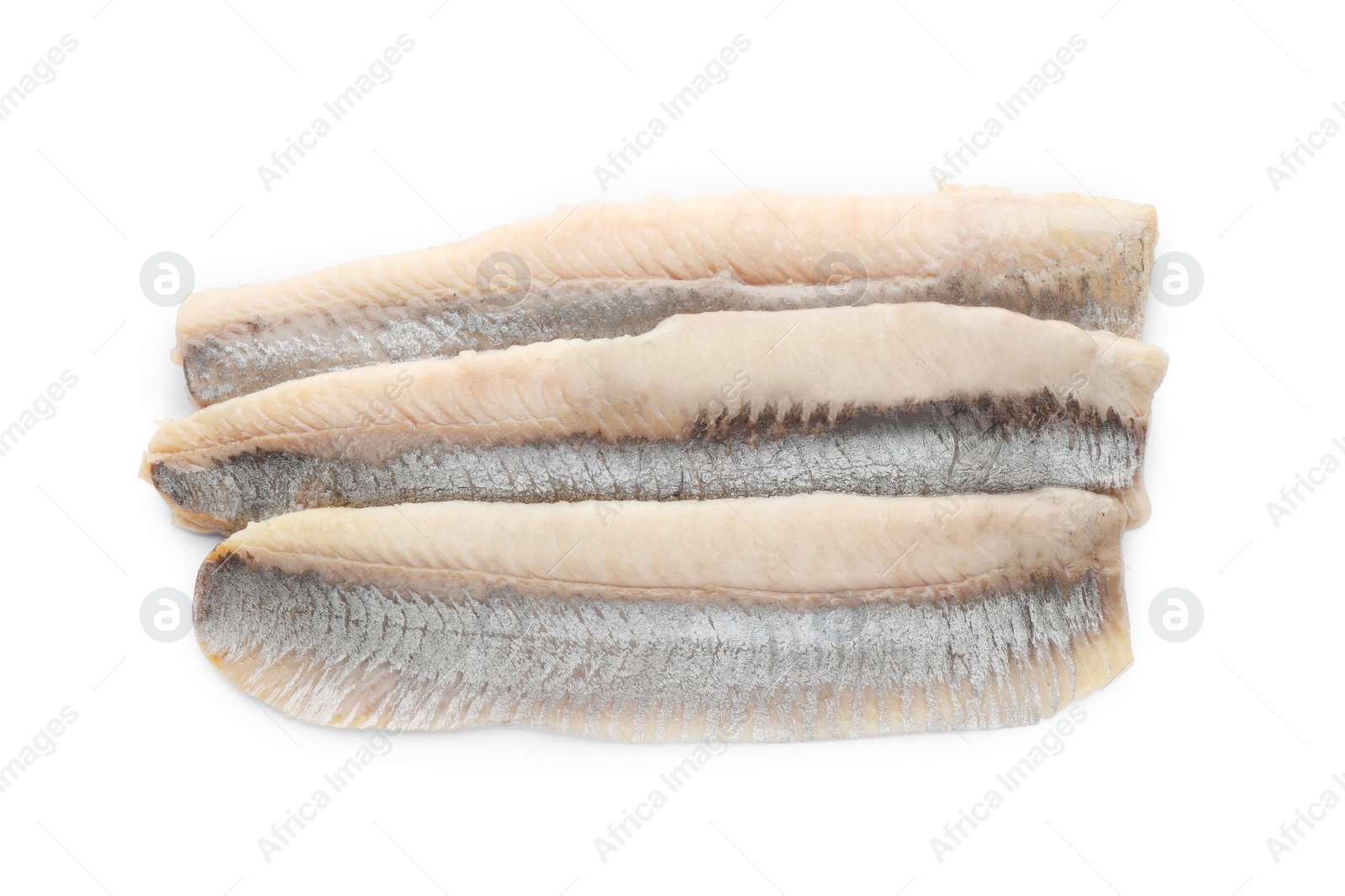 Photo of Delicious salted herring fillets on white background, top view