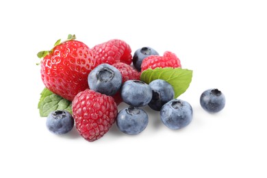 Many different ripe berries and mint leaves isolated on white